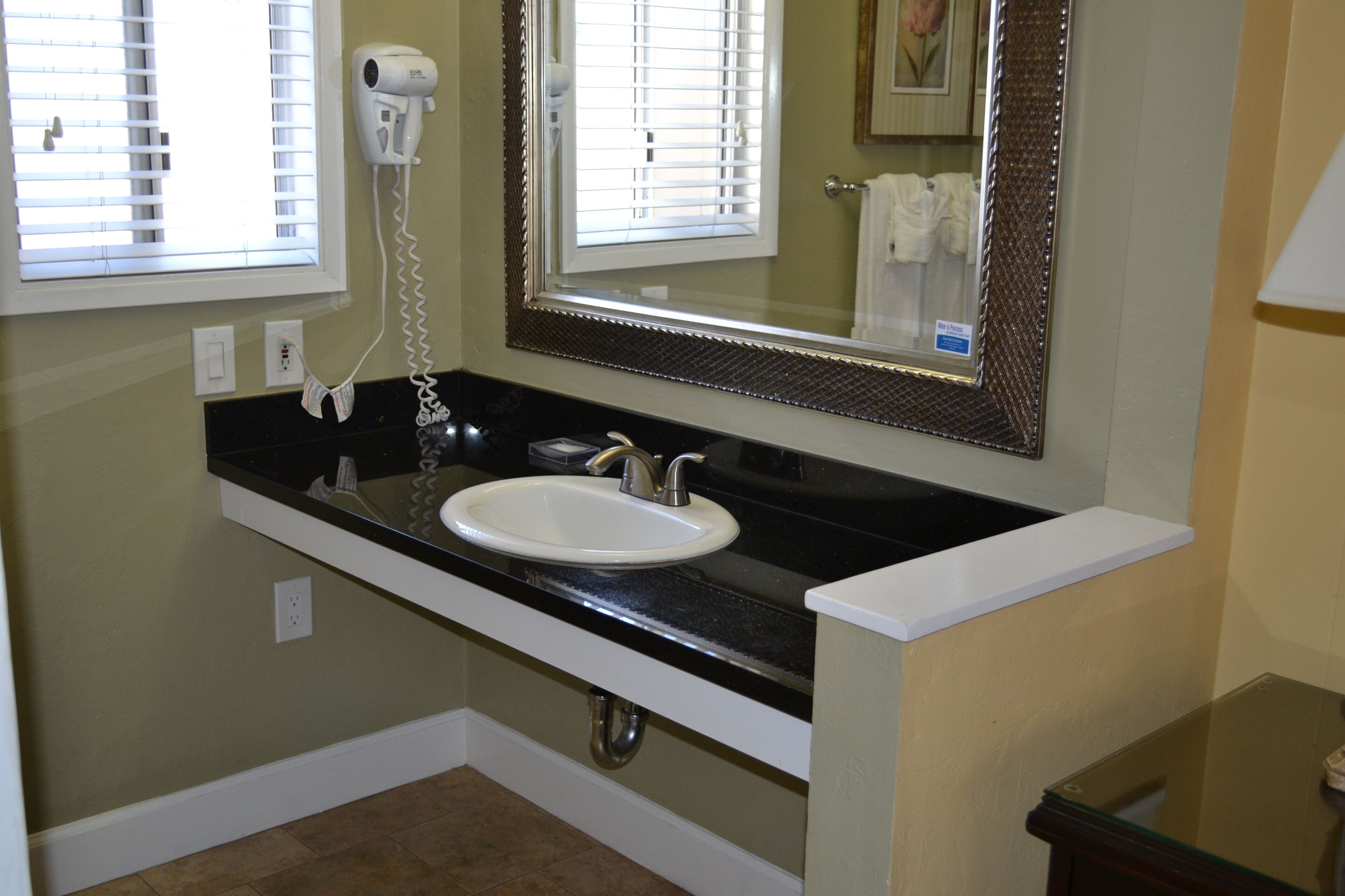 standard room, 1 queen bed | bathroom | free toiletries, hair dryer, towels