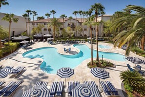 2 outdoor pools, a heated pool, pool umbrellas, pool loungers