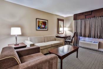 In-room safe, desk, laptop workspace, blackout drapes at Tuscany Suites & Casino