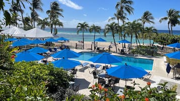 Outdoor pool, open 7:00 AM to 7:00 PM, pool umbrellas, pool loungers