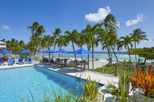 Outdoor pool, open 7:00 AM to 7:00 PM, pool umbrellas, pool loungers
