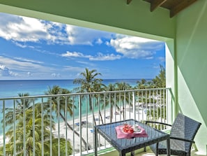 Deluxe Room, Oceanfront | In-room safe, desk, laptop workspace, iron/ironing board - Coconut Court Beach Hotel (Hastings)