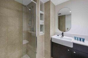 Shower, free toiletries, hair dryer, towels