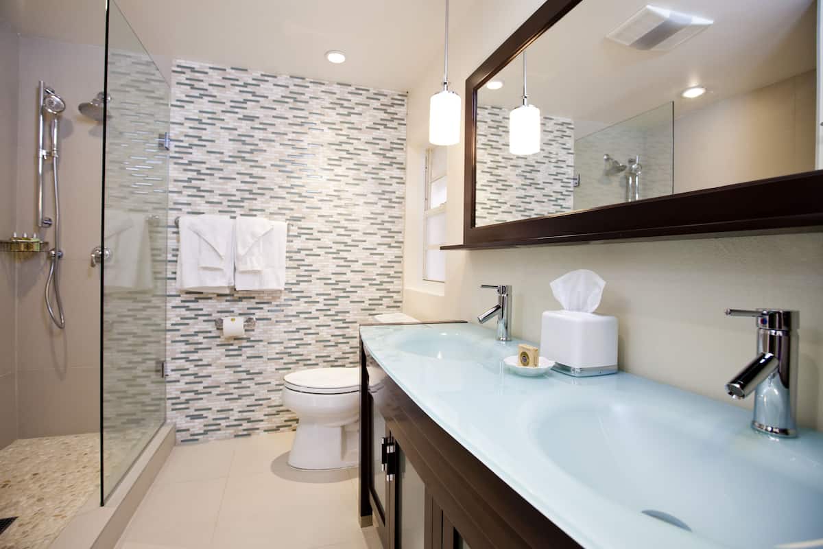 shower, rainfall showerhead, designer toiletries, hair dryer