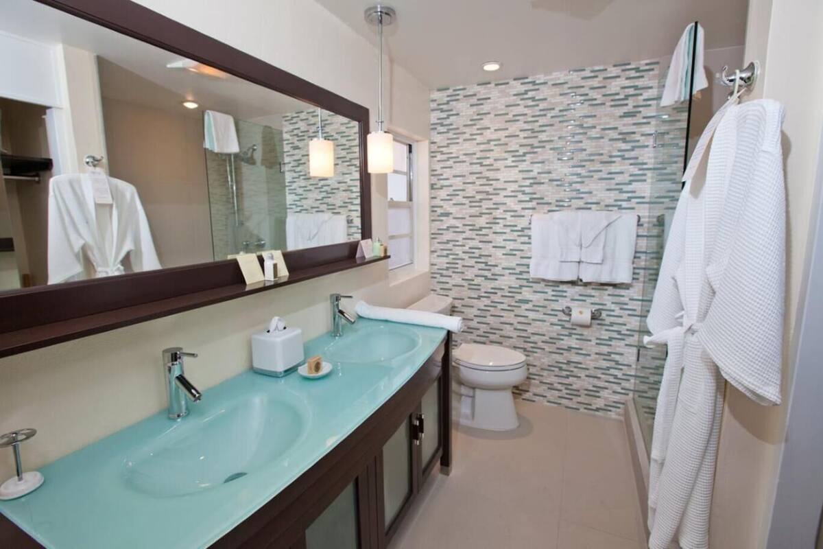 shower, rainfall showerhead, designer toiletries, hair dryer