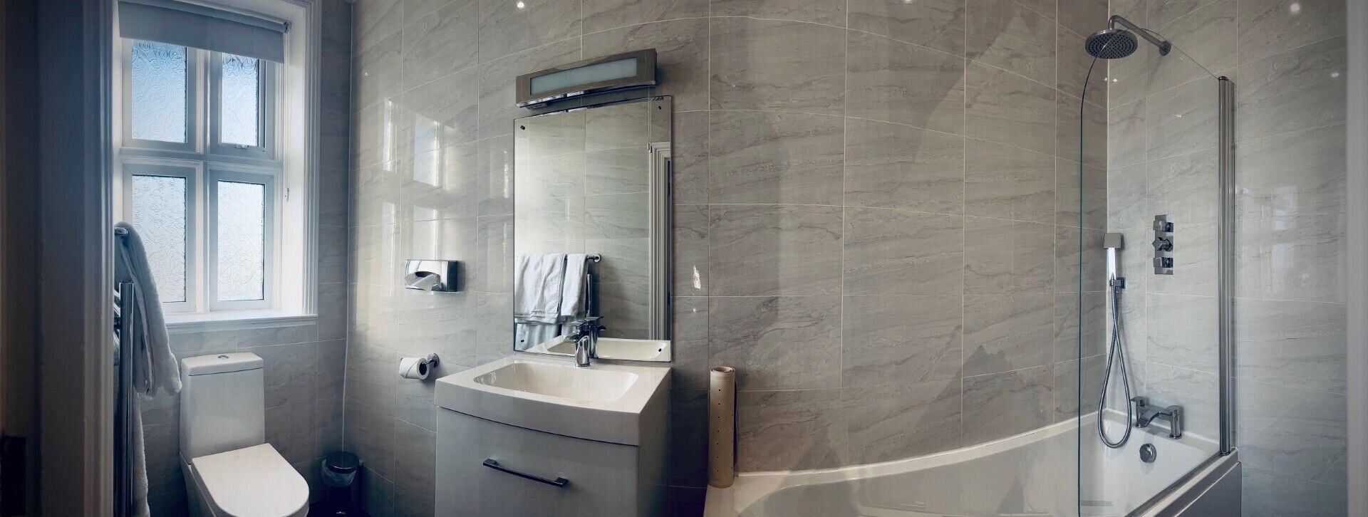 family room, non smoking (multiple beds) | bathroom | combined shower/bathtub, deep-soaking bathtub, free toiletries