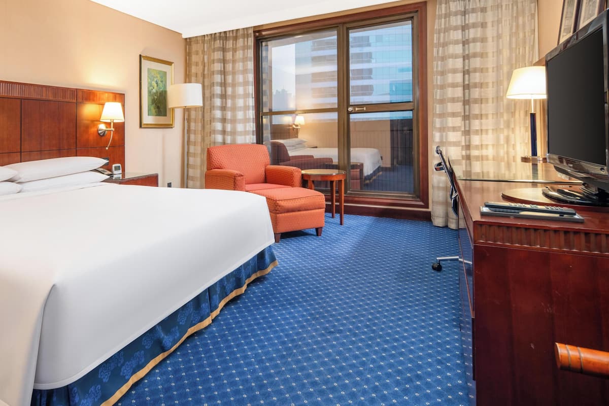 Deluxe King Room | Down comforters, minibar, in-room safe, desk