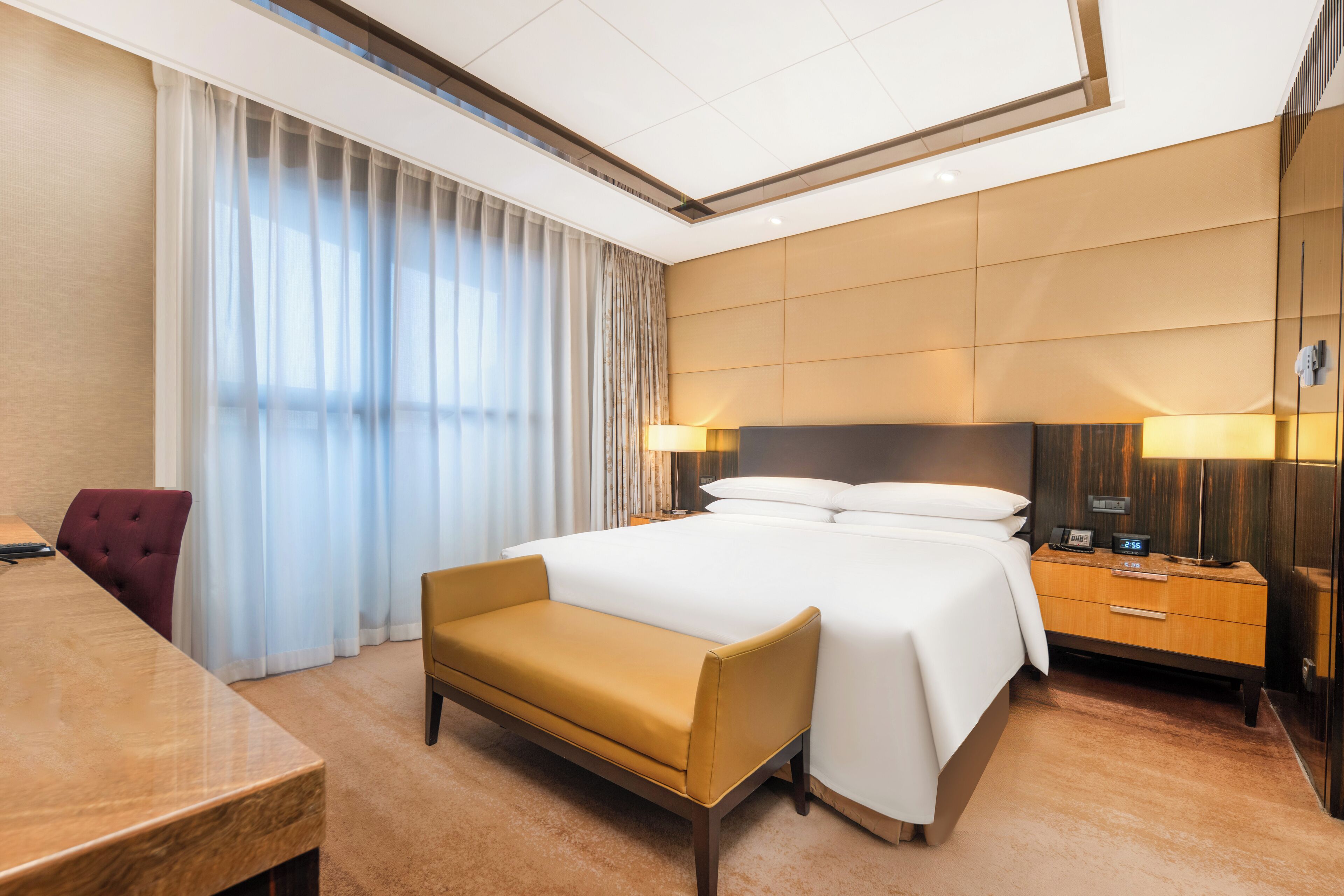 Deluxe Suite, City View | Down comforters, minibar, in-room safe, desk