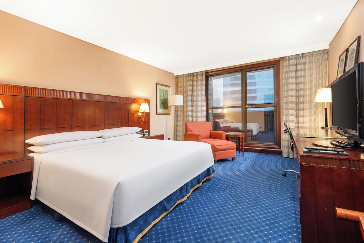 Deluxe King Room | Down comforters, minibar, in-room safe, desk