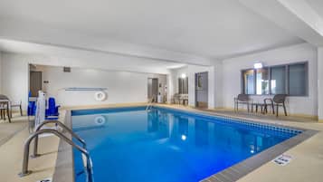 Indoor pool, open 7:00 AM to 11:00 PM, pool loungers