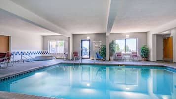 Indoor pool, open 7:00 AM to 11:00 PM, pool loungers