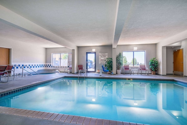 Indoor pool, open 7:00 AM to 11:00 PM, pool loungers