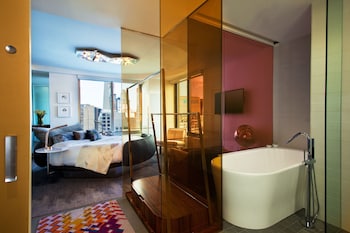 Combined shower/tub, rainfall showerhead, free toiletries, hair dryer at W New York - Times Square