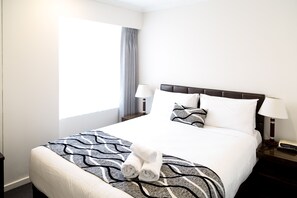 Premium bedding, pillowtop beds, desk, blackout drapes