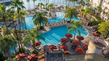 4 outdoor pools, open 7:00 AM to 11:00 PM, cabanas (surcharge)