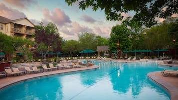 Indoor pool, seasonal outdoor pool, pool umbrellas, pool loungers