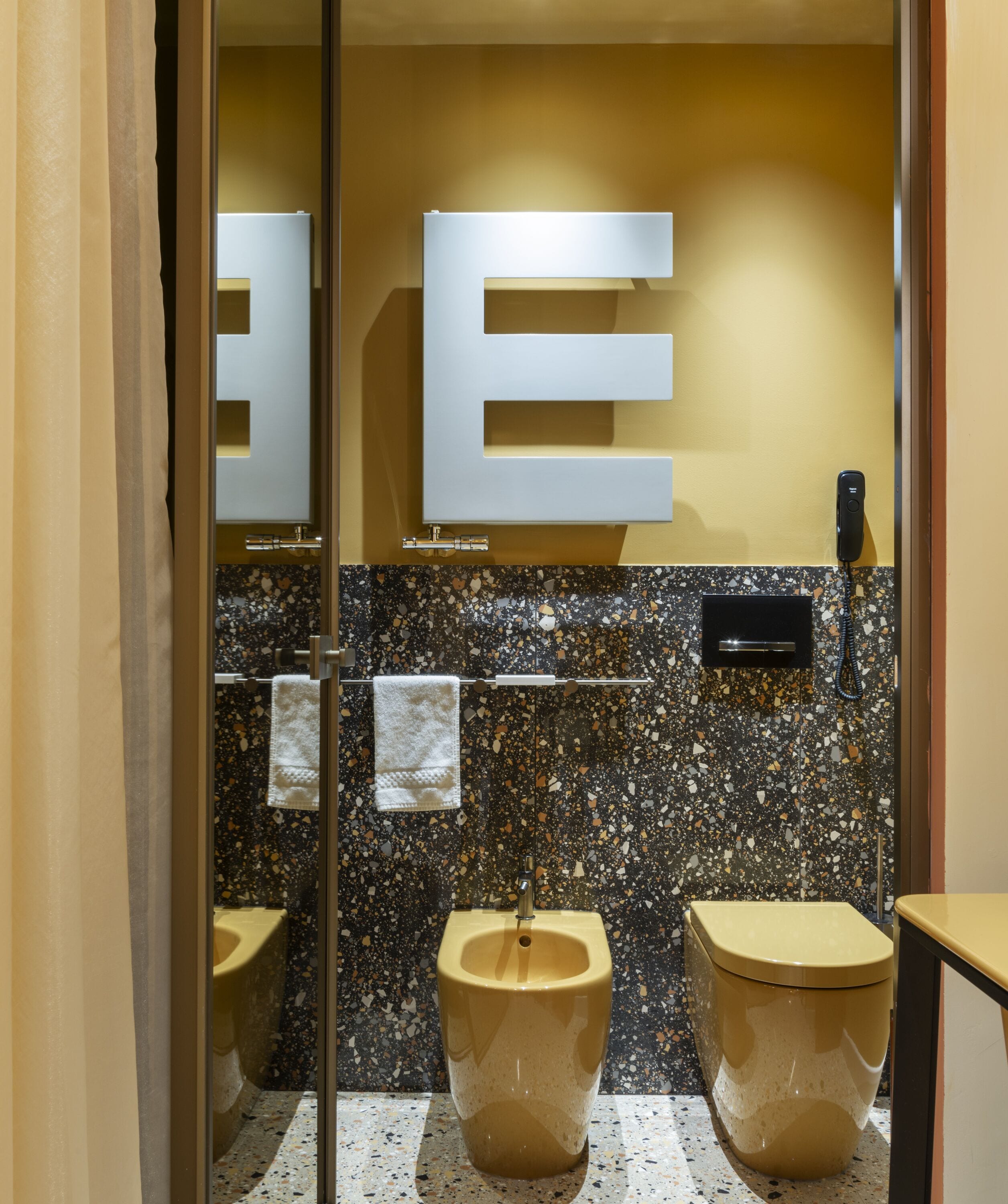 nesting private suite | bathroom | eco-friendly toiletries, hair dryer, slippers, bidet