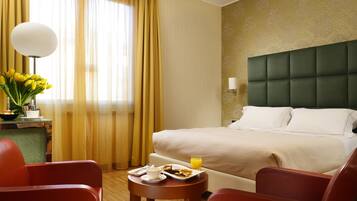 Ropa de cama de alta calidad y minibar