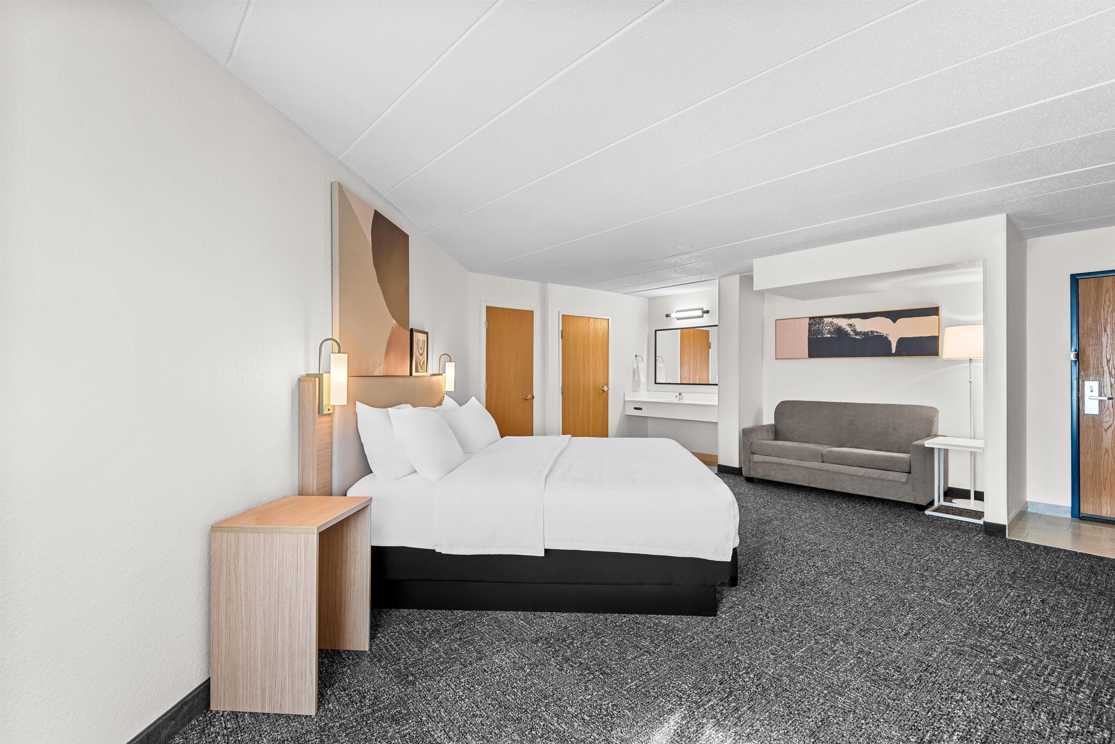 Room, 1 King Bed with Sofa bed | Living area | 32-inch LCD TV with cable channels, TV