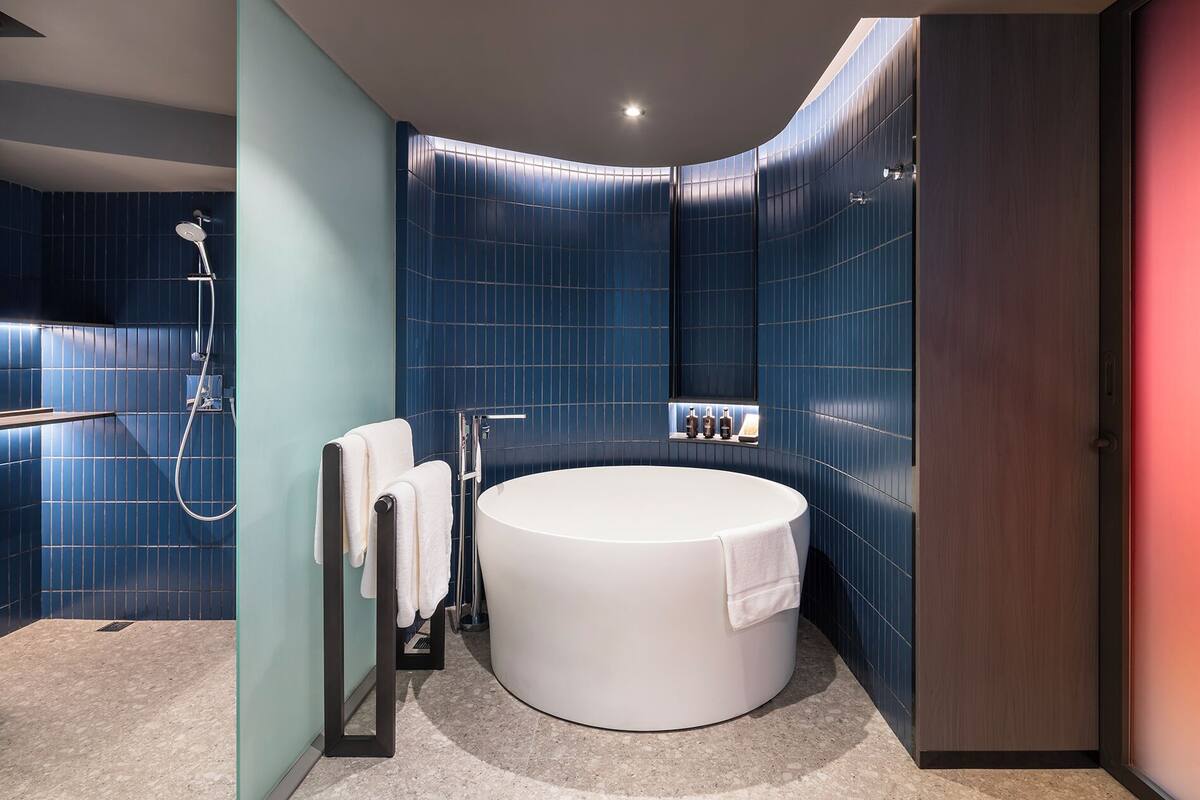 gold suite - newly renovated | bathroom | free toiletries, hair dryer, bathrobes, slippers