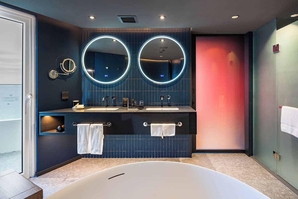 platinum suite - newly renovated | bathroom | free toiletries, hair dryer, bathrobes, slippers