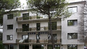 A multi-story building with balconies and large windows, labeled "CLUB HOTEL". - Club Hotel (Mestre)