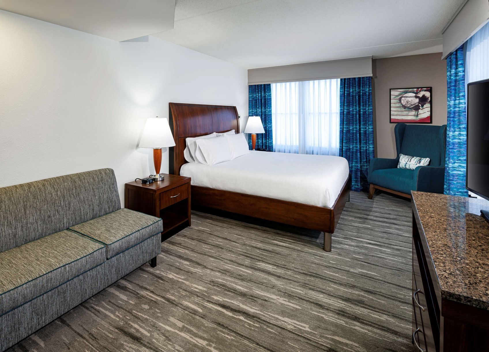 Premium bedding, down comforters, in-room safe, desk