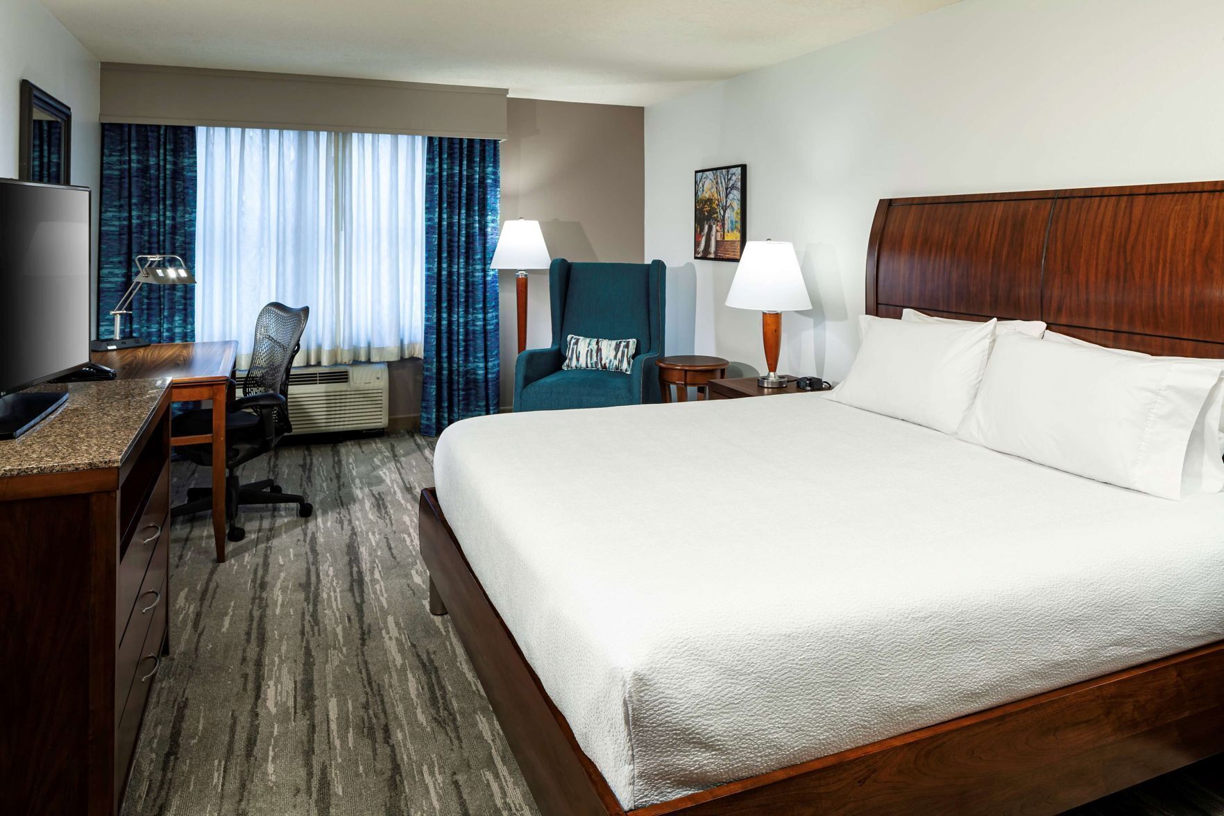 Premium bedding, down comforters, in-room safe, desk