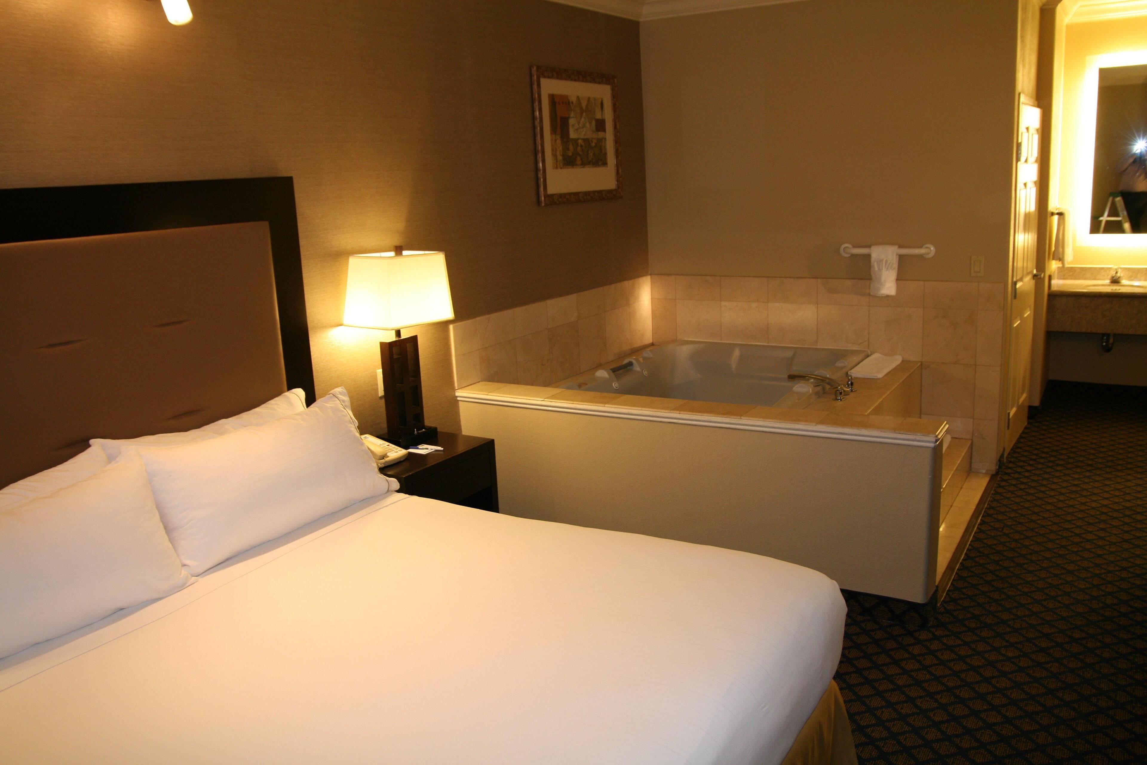Premium bedding, desk, blackout drapes, iron/ironing board