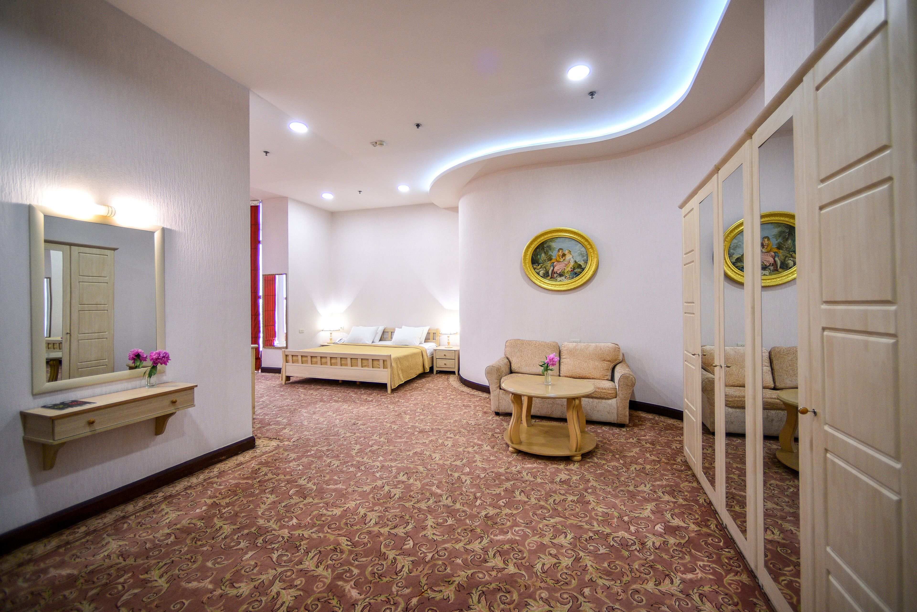 Honeymoon Studio Suite, City View | Living area | TV