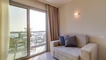 Suíte executiva, vista para o mar | Camas Select Comfort, cofres nos quartos, escrivaninha
