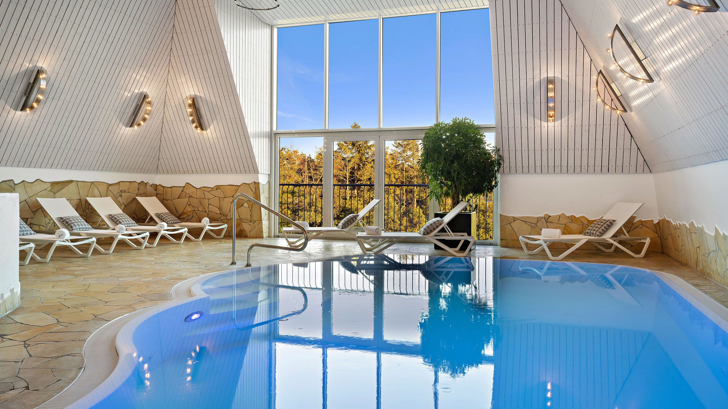 indoor pool, 2 outdoor pools, open 8:00 am to 9:00 pm, pool umbrellas