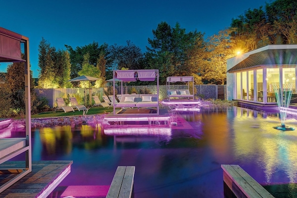 Indoor pool, 2 outdoor pools, open 8:00 AM to 9:00 PM, pool umbrellas
