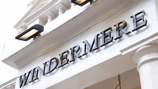 A building with the name "WINDERMERE" prominently displayed on a white facade with classical architectural details. - The Windermere Hotel, London (London)