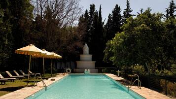 Seasonal outdoor pool, open 9:30 AM to 8:30 PM, sun loungers