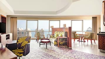Suite, 1 King Bed, Non Smoking, Sea View | Living room | 42-inch LCD TV with satellite channels, TV, offices