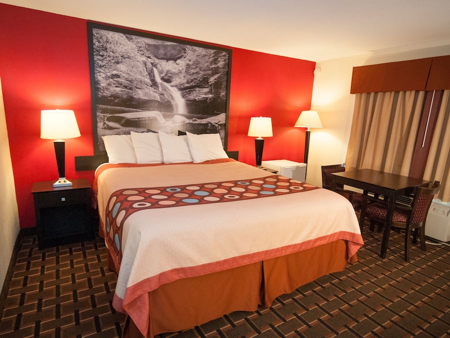 Desk, laptop workspace, iron/ironing board, free cots/infant beds