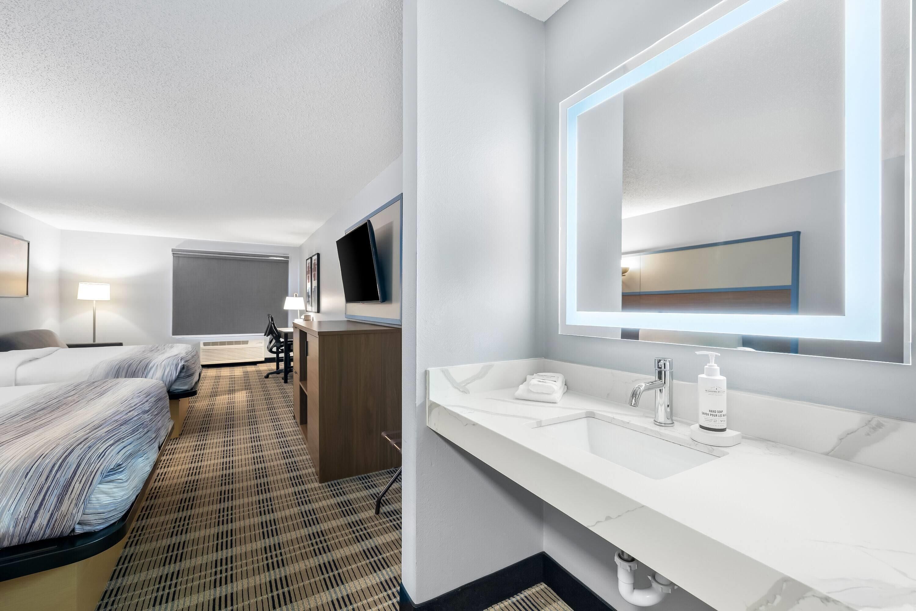 Premier Room, 2 Queen Beds, Non Smoking | Desk, laptop workspace, blackout drapes, iron/ironing board