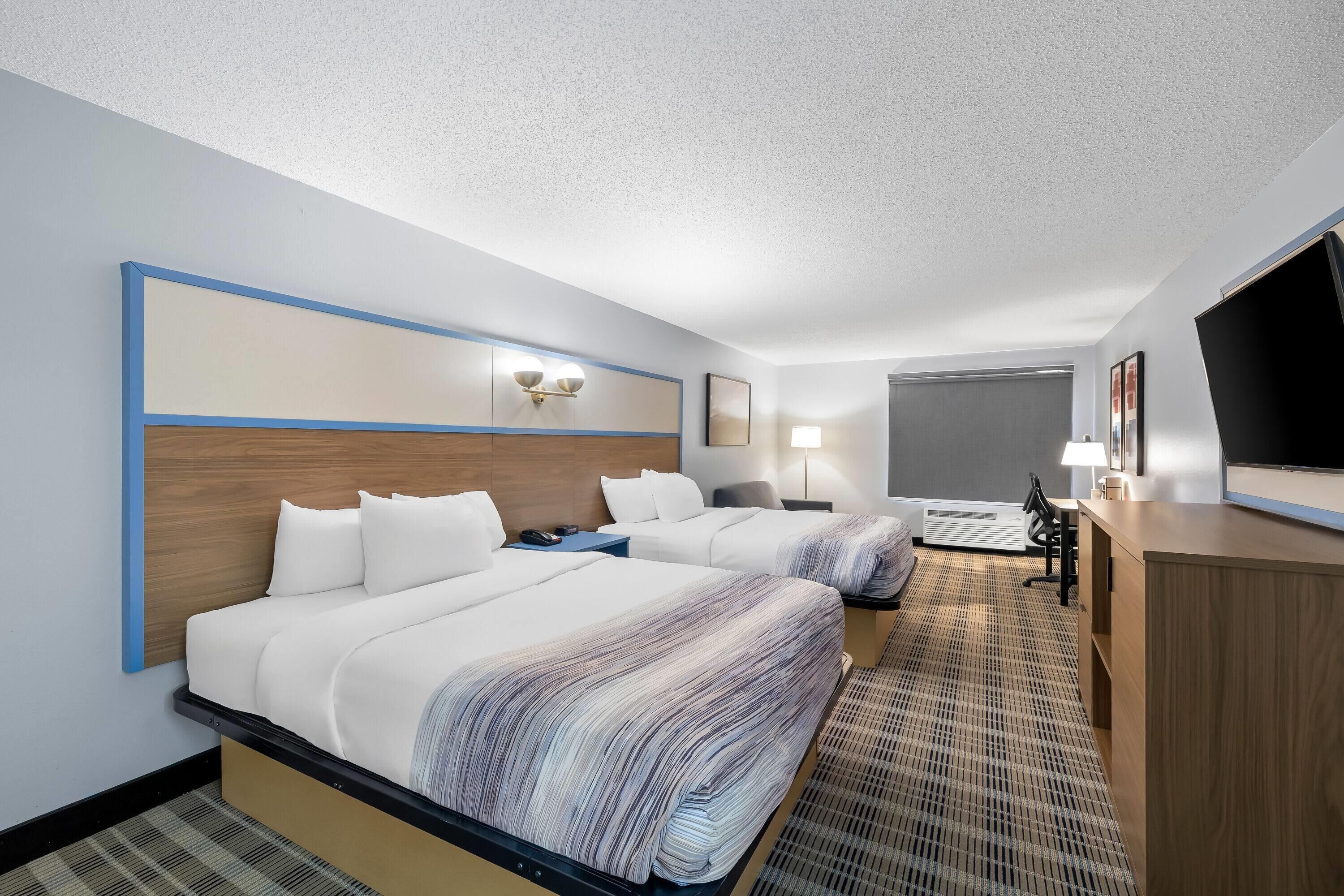 Habitación Premier, 2 camas Queen size, para no fumadores | Escritorio, espacio para trabajar con laptop y cortinas blackout 