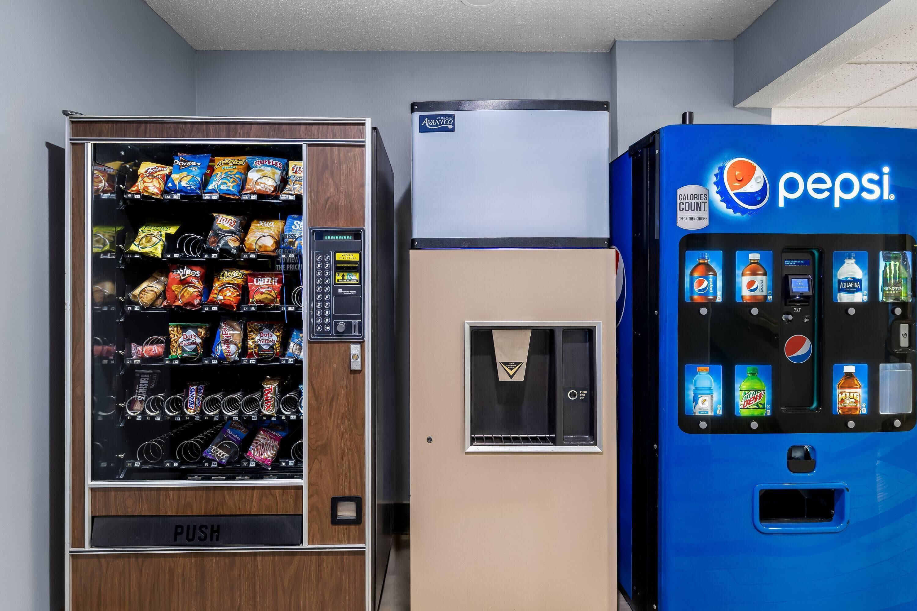 A vending machine with snacks and a Pepsi dispenser.