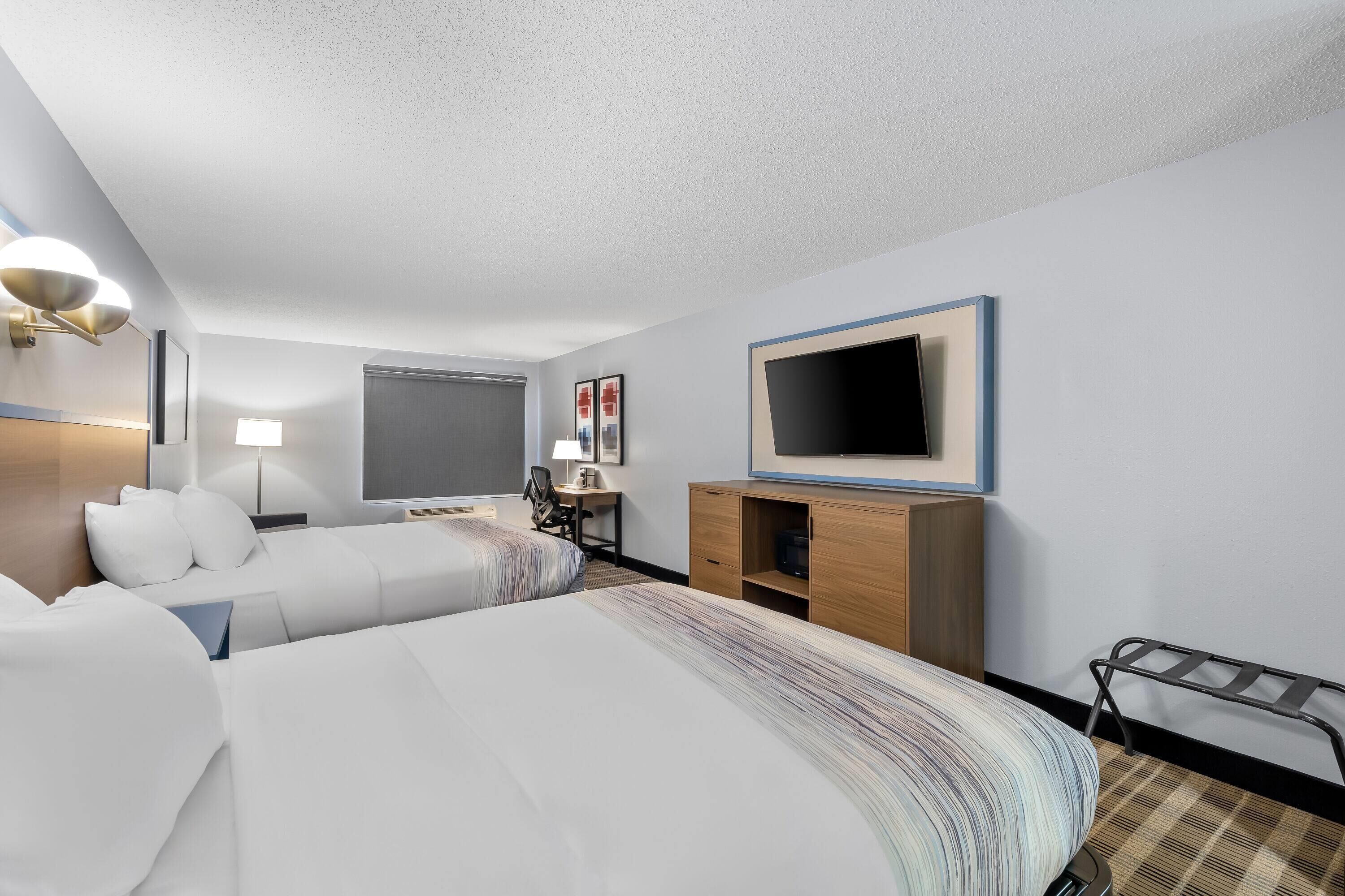 Premier Room, 2 Queen Beds, Non Smoking | Desk, laptop workspace, blackout drapes, iron/ironing board