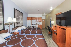 Desk, laptop workspace, blackout drapes, iron/ironing board