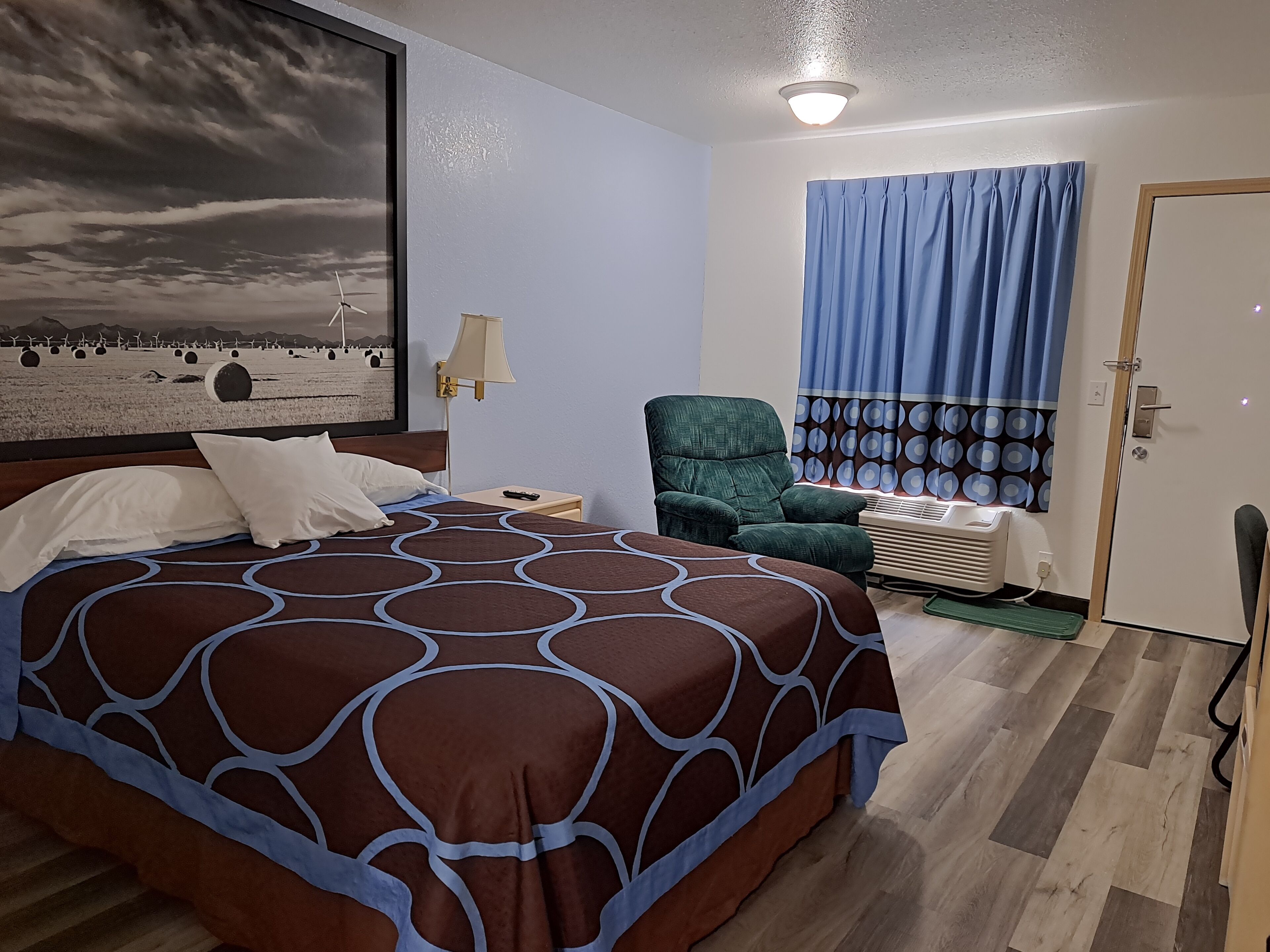 1 queen bed, accessible room, first floor, non-smoking | desk, laptop workspace, blackout curtains, iron/ironing board