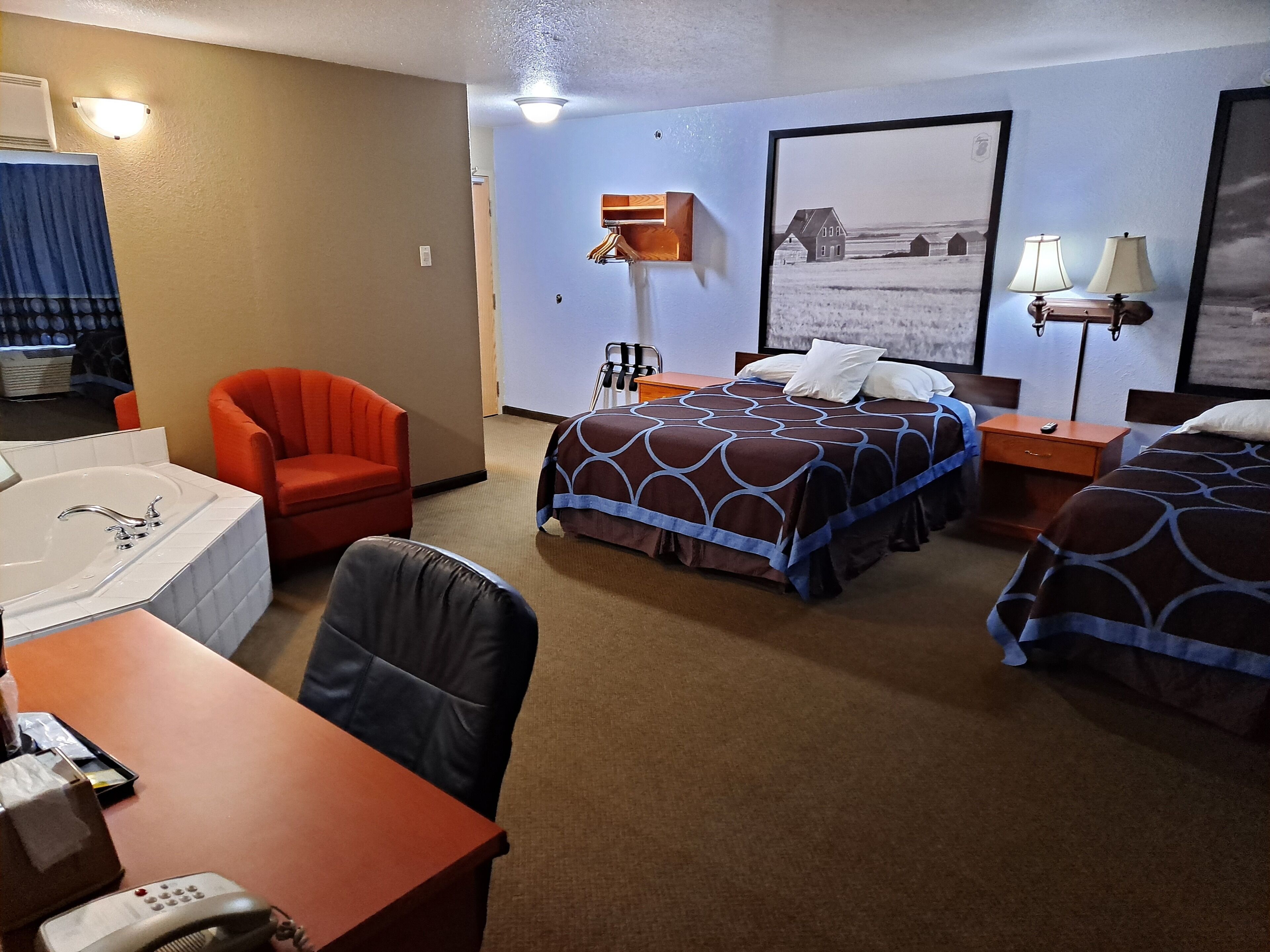 suite, 2 queen beds, fireplace | desk, laptop workspace, blackout curtains, iron/ironing board