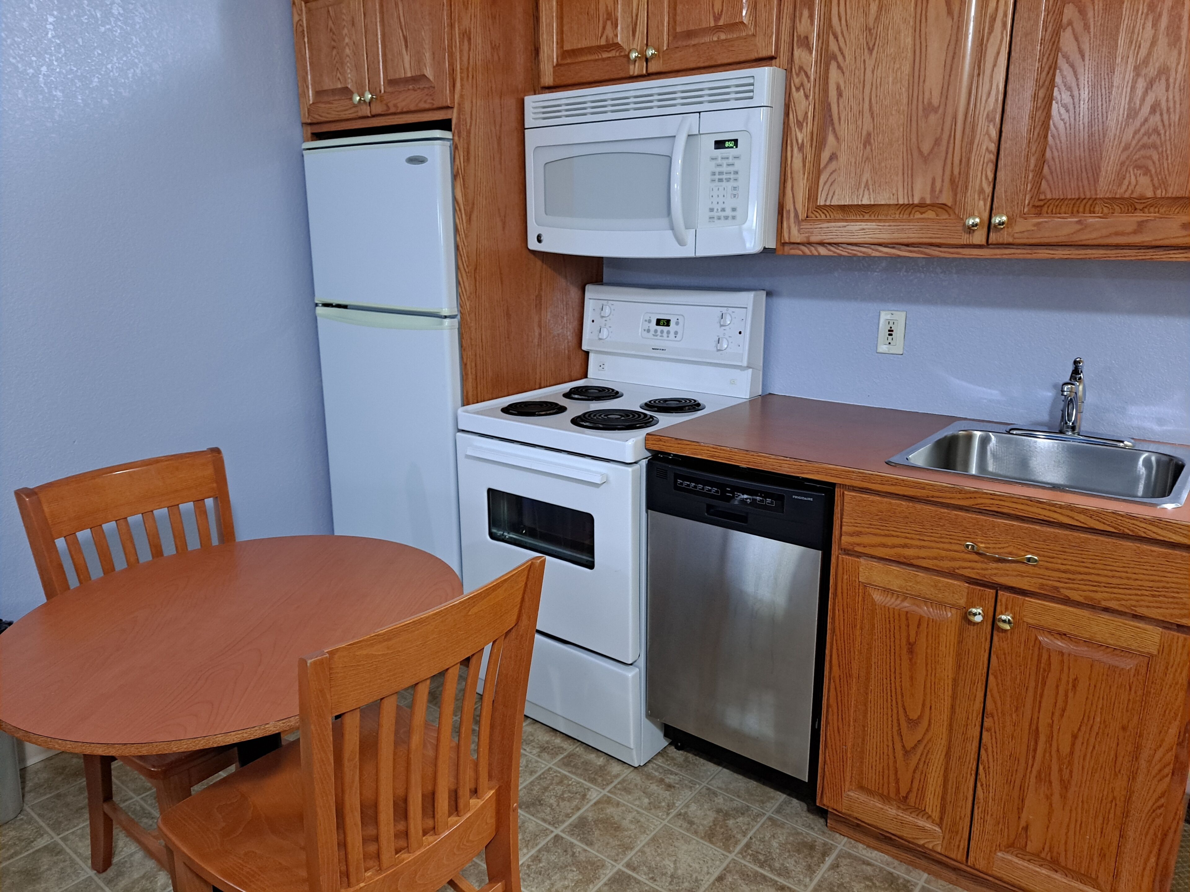 desk, laptop workspace, blackout curtains, iron/ironing board