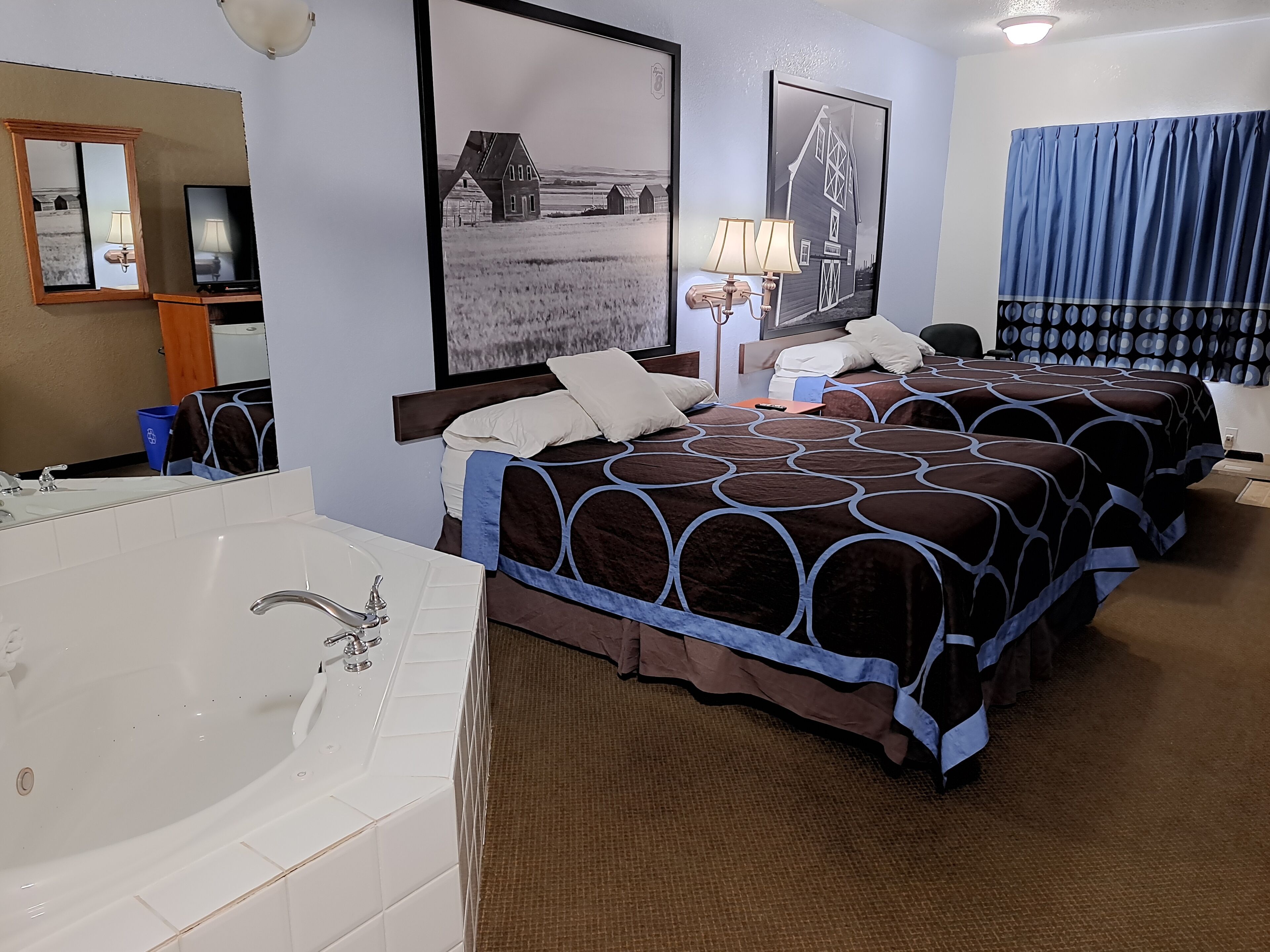 desk, laptop workspace, blackout curtains, iron/ironing board