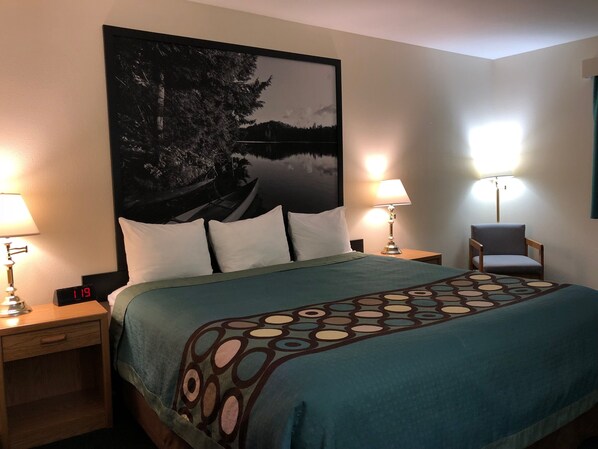 Suite, 1 King Bed, Non Smoking | Desk, laptop workspace, blackout curtains, iron/ironing board