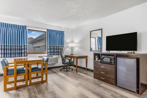 Room, 1 King Bed | Desk, iron/ironing board, free cribs/infant beds, rollaway beds