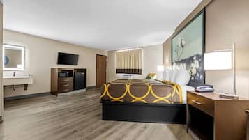 Suíte estúdio, 1 cama King, para não fumantes | Escrivaninha, espaço de trabalho para notebook, cortinas blackout