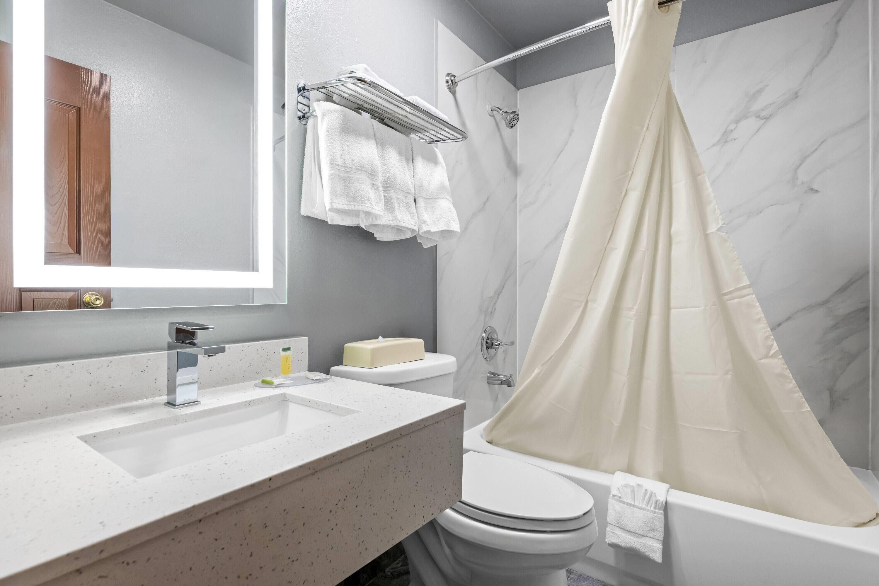 Double Room, 2 Double Beds | Bathroom | Combined shower/tub, free toiletries, hair dryer, towels